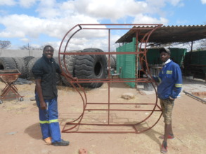 Ngqabutho (left) designed a new shelf for client