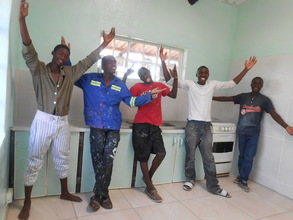 The proud Zimkids tile team in new kitchen