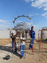 Brighten, Denver and Ncosi with Peace sculpture