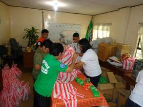 AAI Staff Preparing Aid Materials