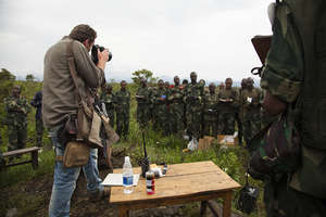 RISC trainee Pete Muller photographing in Congo