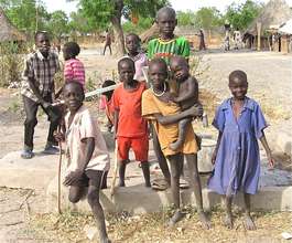 Kids test an ASMP hand pump