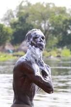 Man washing in river