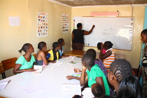 Girls attending class at the shelter