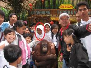 Erin with other orphans visiting a zoo in 2009