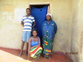 Memory, center, with her mother and brother