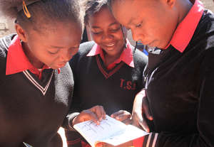 Memory, enjoying a comic book with her friends