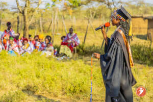 Lilian giving a speech during her graduation party