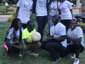 Lilian and Patrick with other beneficiaries