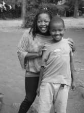 Younger Patrick with Shiku (our founder).