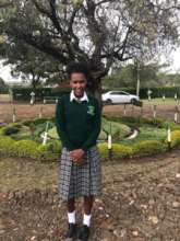 Pulei in her new school uniform