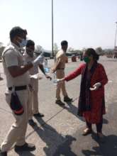 Providing Water and Sanitizing Kits to Police