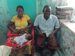 Family in Liberia with their week old child.