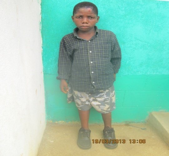 Stephen in his first pair of shoes