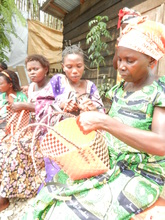 weaving baskets at the Community Resource Center