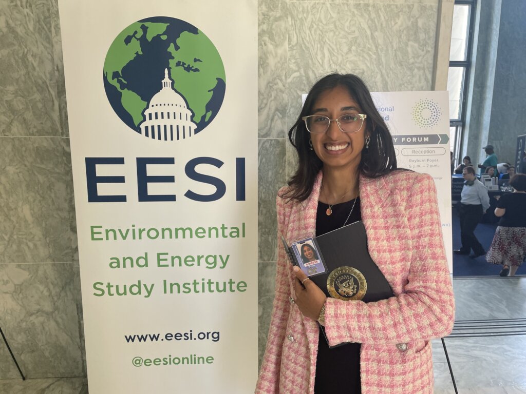 Aastha with her Hill staff badge at EESI's EXPO