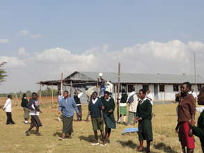 Recess games with classrooms in background