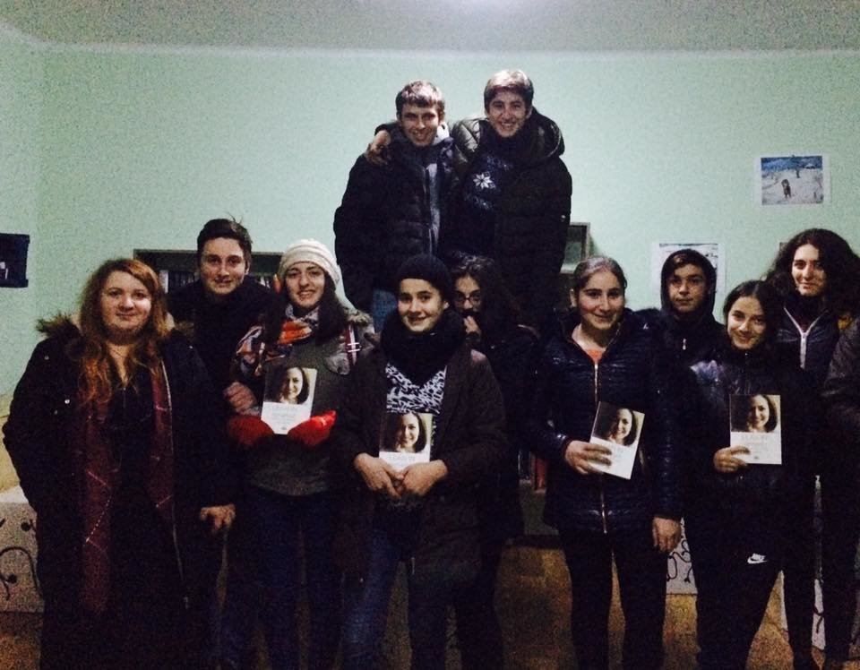 Visiting reading group in Niqozi, conflict zone