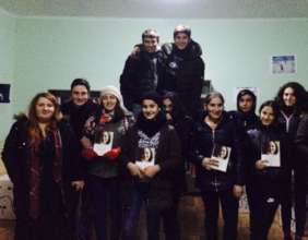 Visiting reading group in Niqozi, conflict zone