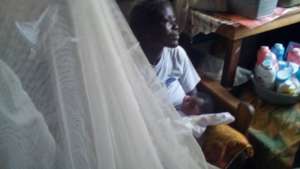 Beneficiary and her week old baby