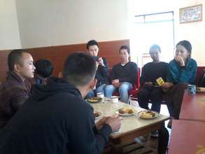 Monthly YI meeting at YDF cafeteria.