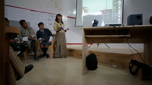 Youth share their photography work at the space