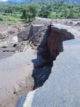Flood damage to main road