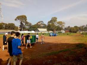 Visitors setting up the mobile school