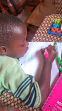 Editha Drawing with Pens from Gift