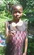 Editha offering a flower of thanks