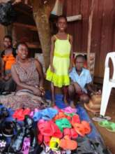 Ines with mother and brother at work 2014