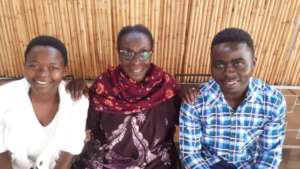 AnnaGrace and Alex with Trustee Judith (center)