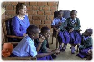 Linda with students in Tanzania