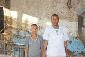 Belay and his son