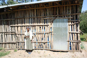 Egowetet outside of the women's rice cooperative