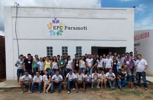 Students in front of their new school house