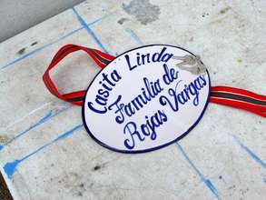 A plaque and a set of keys for the new casita.