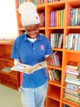 Anesipho in her happy place - the library!