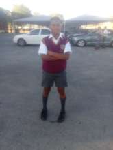 *Alfie in his uniform and his signature shy smile.