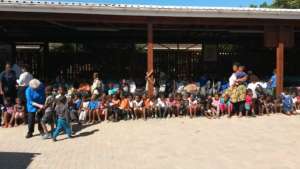 Thankful little ones arriving for food
