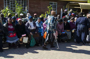 Beneficiaries of the project queing at the centre