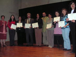 Photo-- Mothers receiving their diplomas