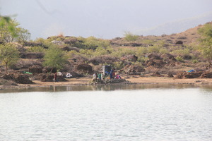 Women collecting water for cooking and drinking