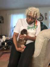 Grandma giving her puppy some love!