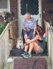 Giving supplies and visiting with a senior!