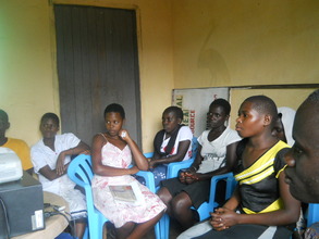 Students at a meeting with staff