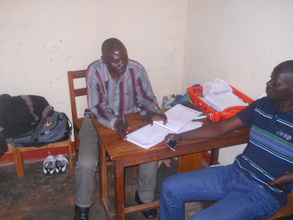 Kaganga John and one of the community members