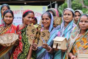 Women show off beautiful bamboo crafts, in India