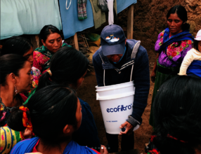 GlobeMed at Cornell & AMMID install a water filter