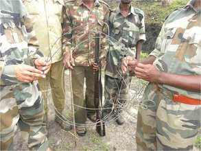 Snares removed during the walks being handed over